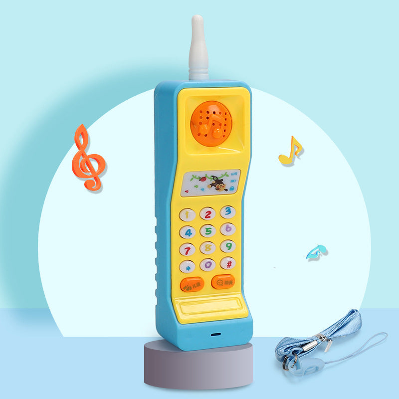 Telefon zabawka w kształcie marchewki