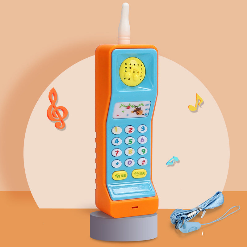 Telefon zabawka w kształcie marchewki