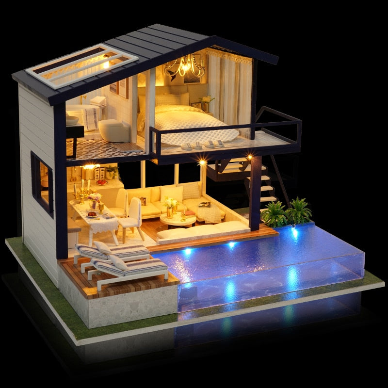 Oświetlony miniaturowy domek z basenem